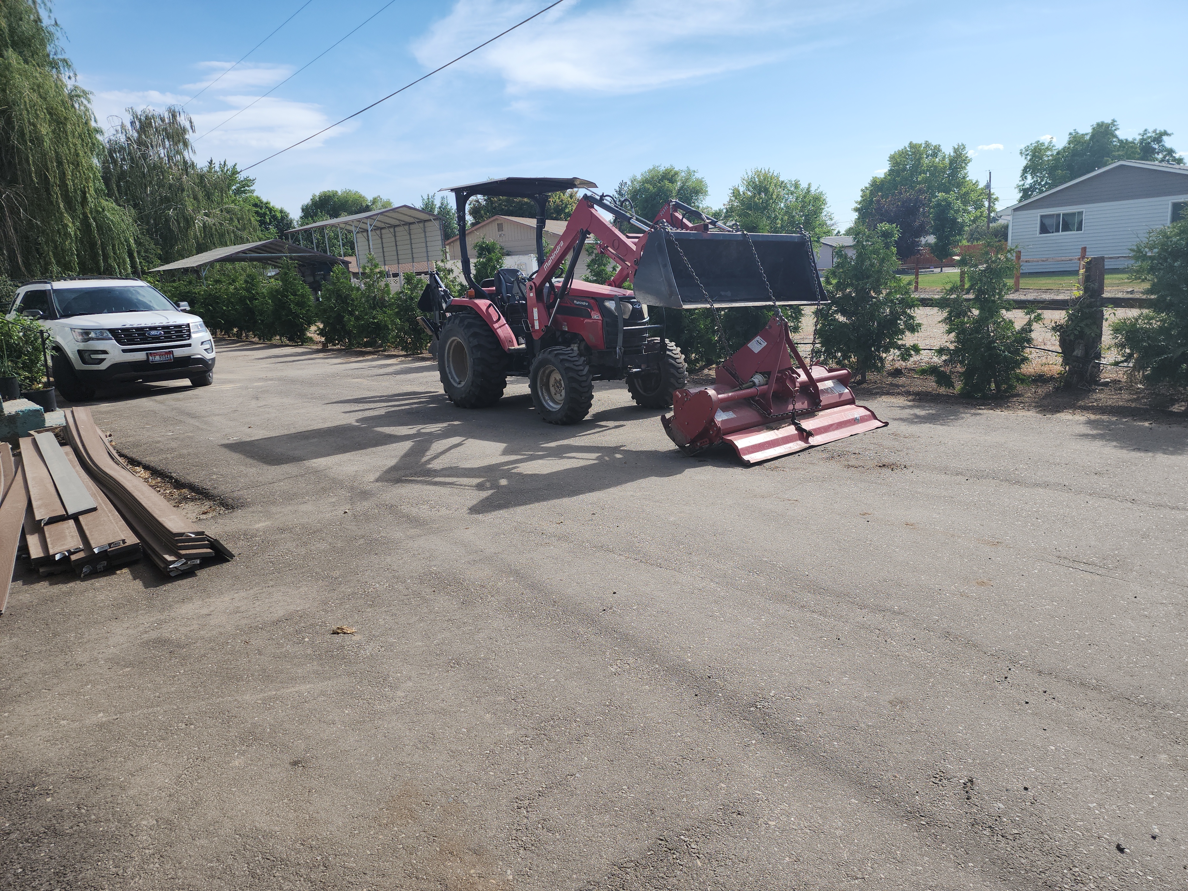 Front end loader moving material